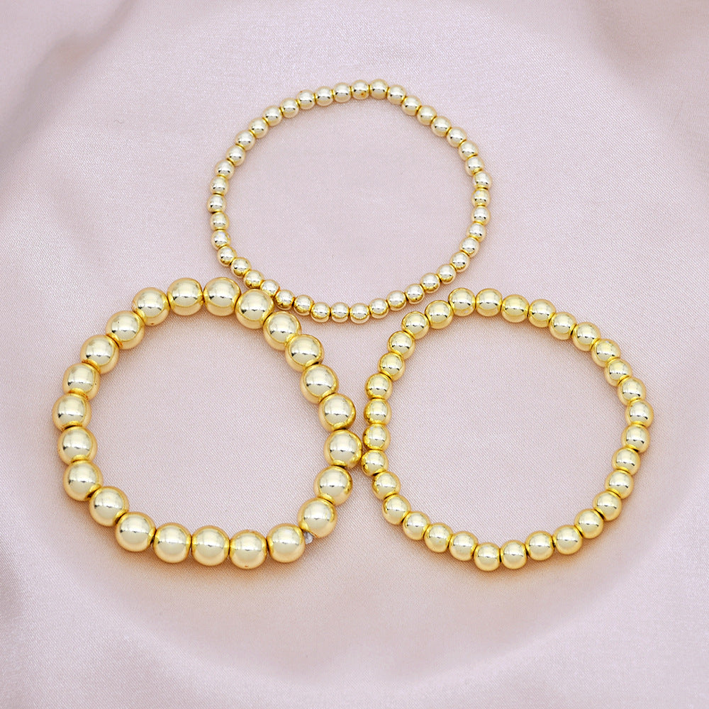 Wholesale beaded gold bracelet men's and women's color-retaining gold-plated elastic multi-layer stacked round bead bracelet bracelet